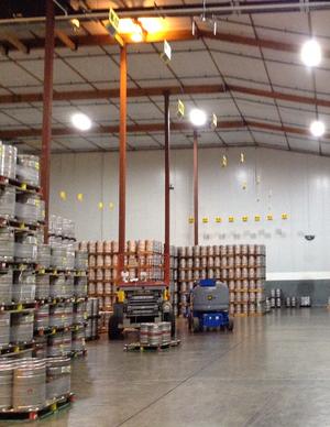 A warehouse filled with lots of beer cans.