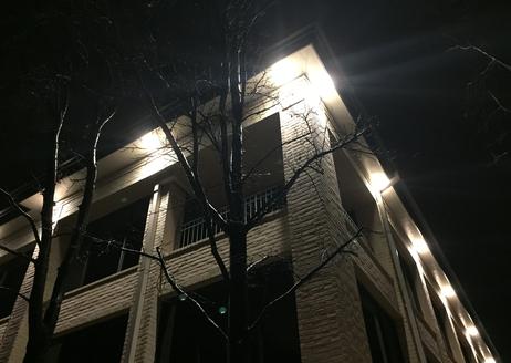 A building with lights on the outside of it