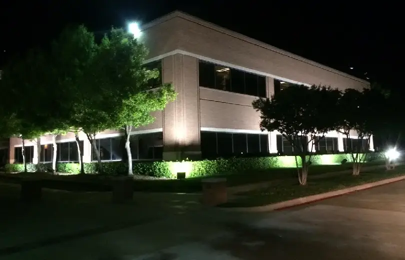 A building with lights on the outside of it